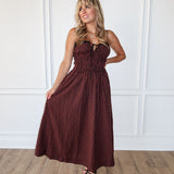 The Thomas Dress is a red and black checkered maxi dress for women—perfect for fall outfits, holiday parties, casual style, and trendy boutique fashion.