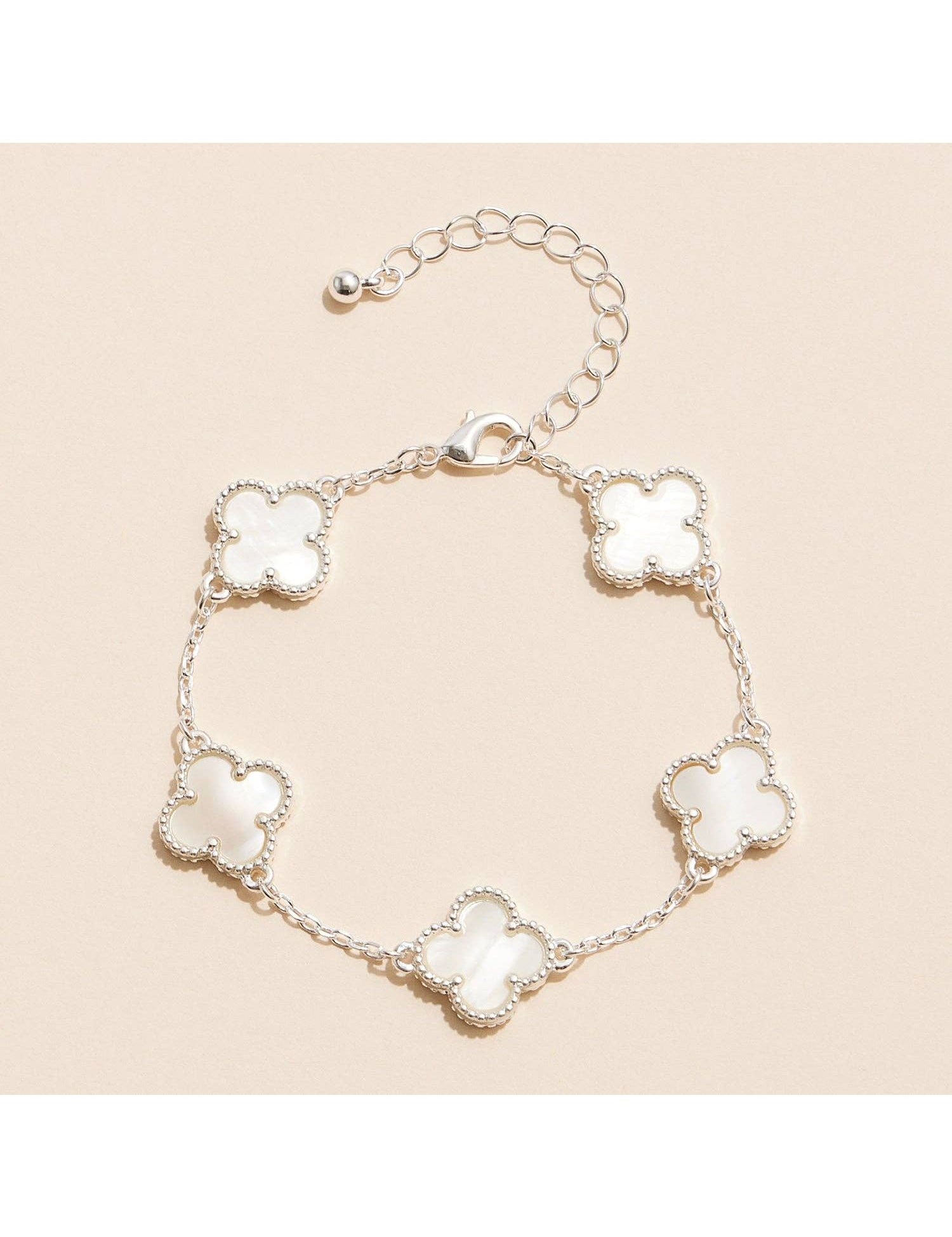 The Colorful Charm Bracelet – Silver/White is a trendy women’s bracelet with bold charms—perfect for layering, everyday outfits, summer looks, and boutique jewelry.