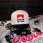 The Drunk Cigs Trucker Hat is a trendy embroidered women’s trucker hat—perfect for casual streetwear, going out looks, and edgy boutique accessories.