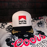 The Drunk Cigs Trucker Hat is a trendy embroidered women’s trucker hat—perfect for casual streetwear, going out looks, and edgy boutique accessories.