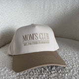 The Mom’s Club Trucker Hat is a stylish embroidered women’s trucker hat—perfect for casual outfits, everyday errands, and trendy boutique accessories.
