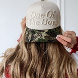 The One of the Boys Trucker Hat is a trendy embroidered women’s trucker hat—perfect for casual outfits, streetwear style, game day, and boutique fashion.