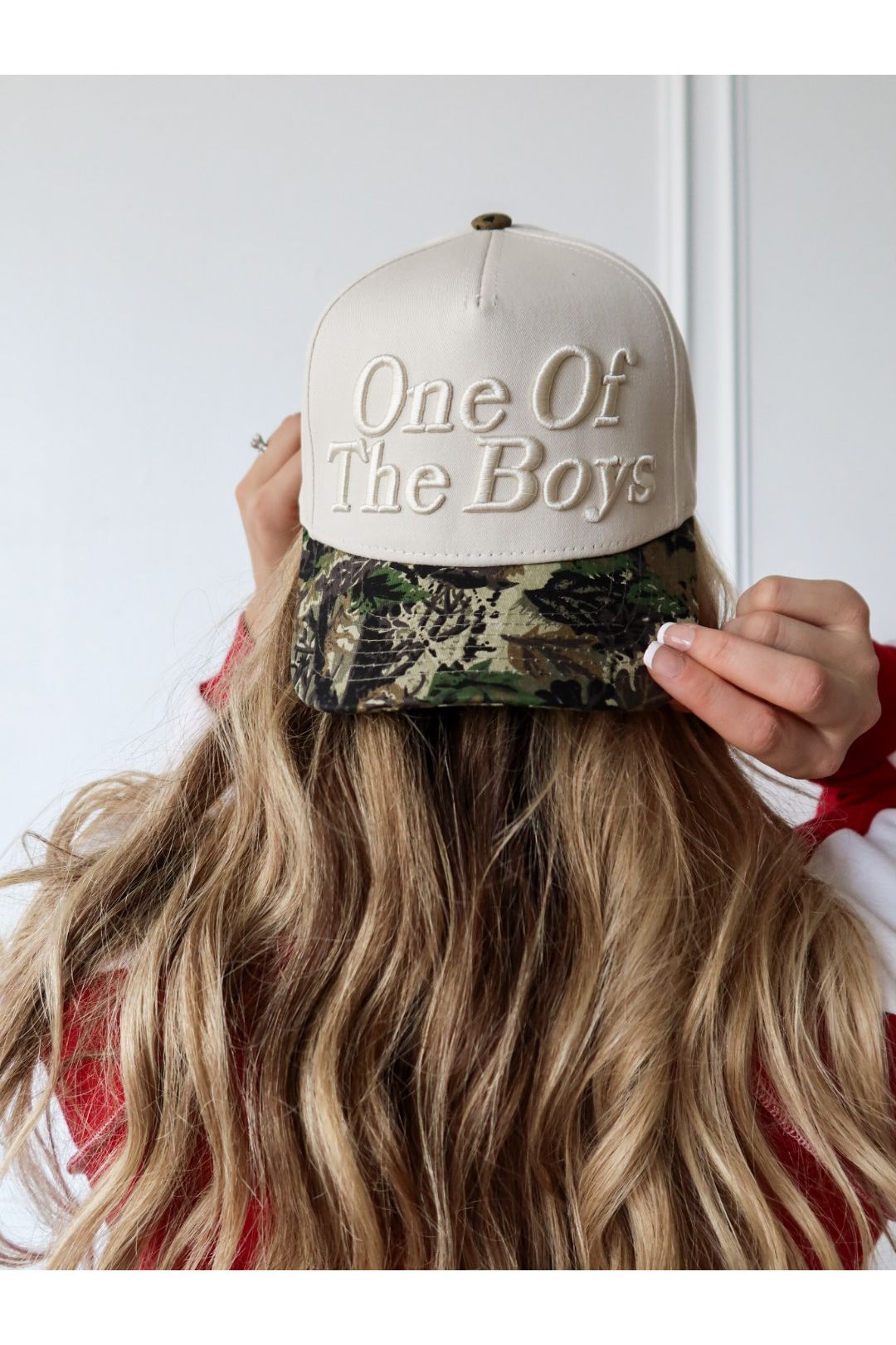 The One of the Boys Trucker Hat is a trendy embroidered women’s trucker hat—perfect for casual outfits, streetwear style, game day, and boutique fashion.